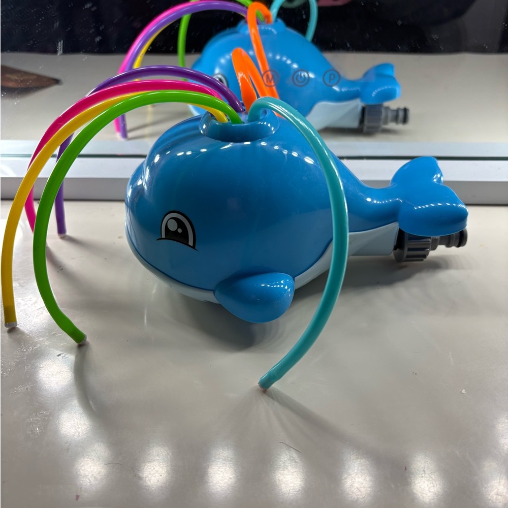 Blue Whale sprinkler with Colorful Sprays